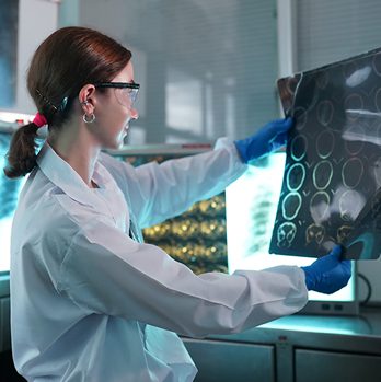 health specialist checking x ray report